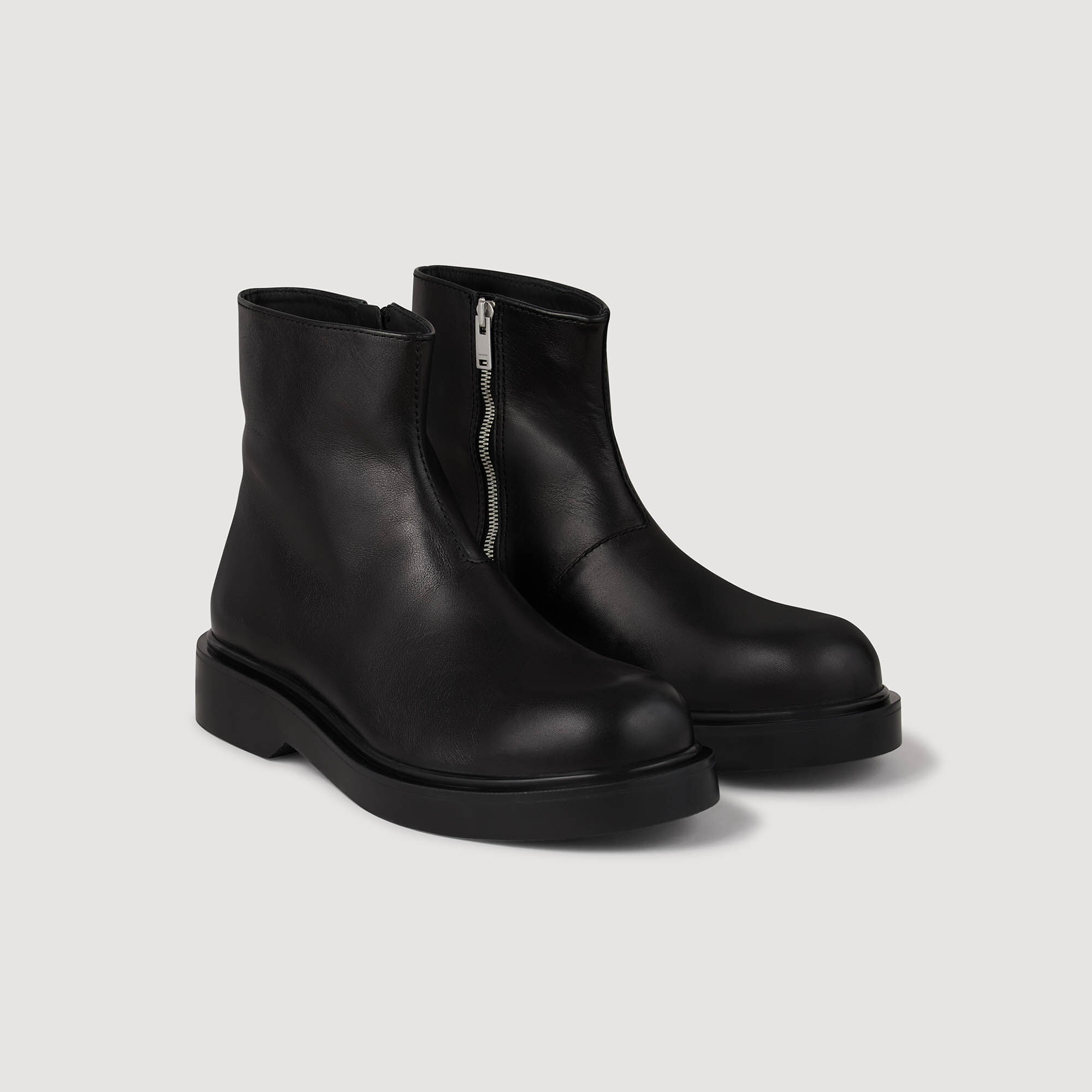 Zipped leather ankle boots