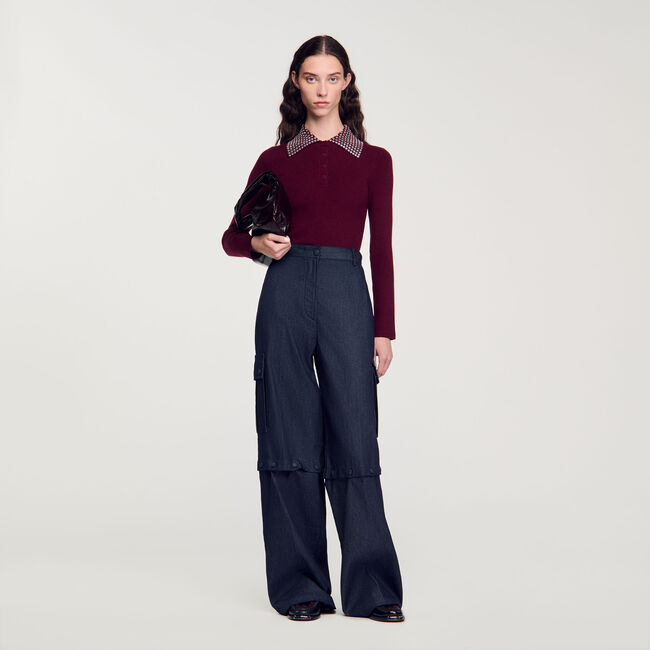 Jumper with metal stud collar