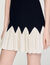 Kurzes zweifarbiges Strickkleid