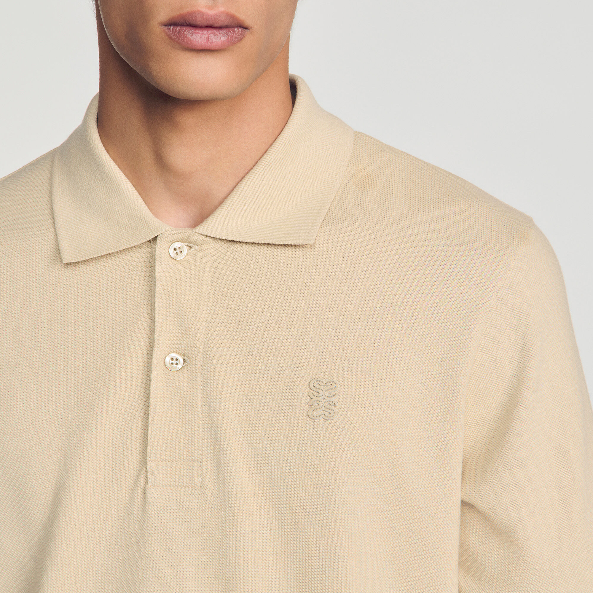 Polo aus Baumwolle mit Lederlogo