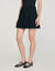 Short tweed pleated skirt