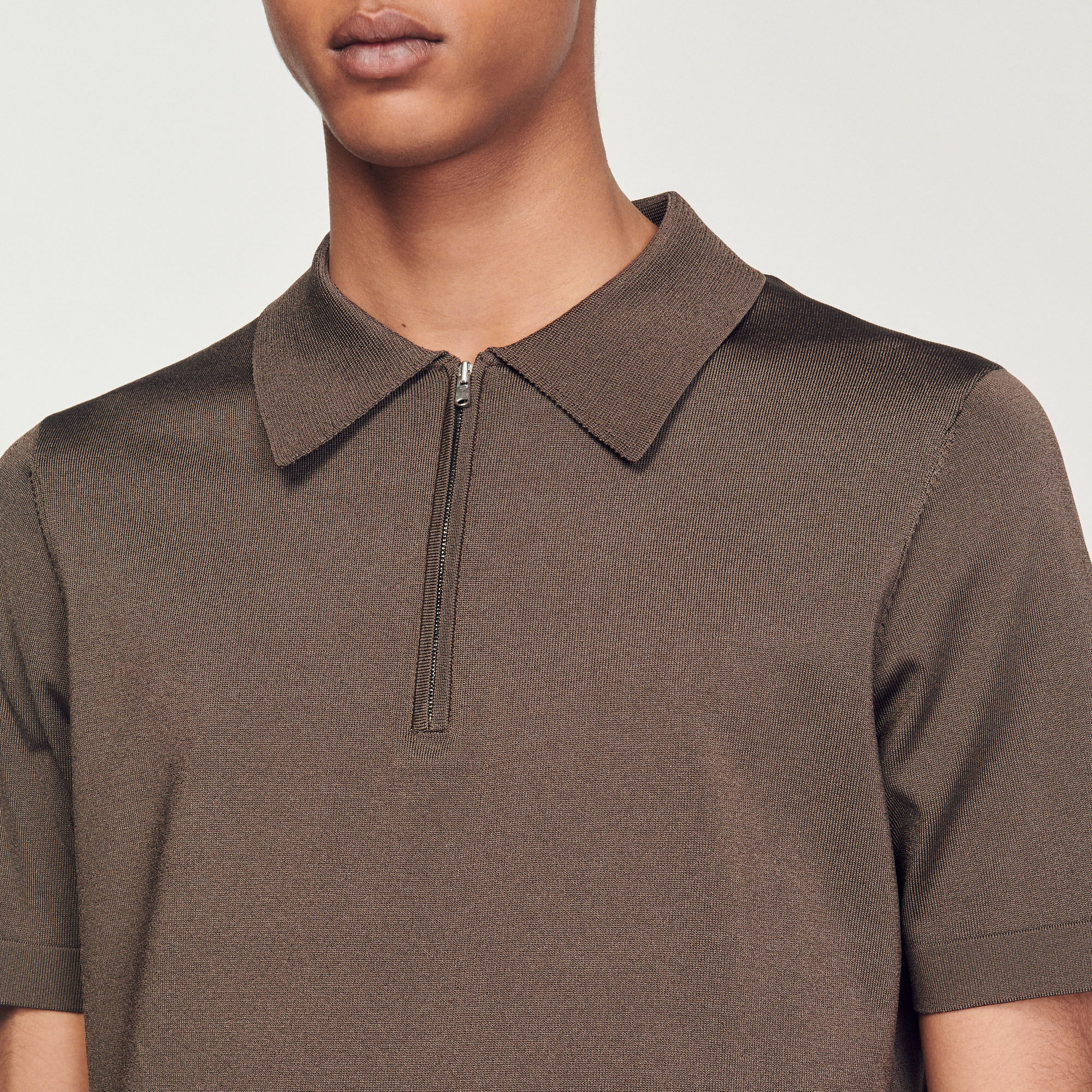 Polo en maille à col zippé