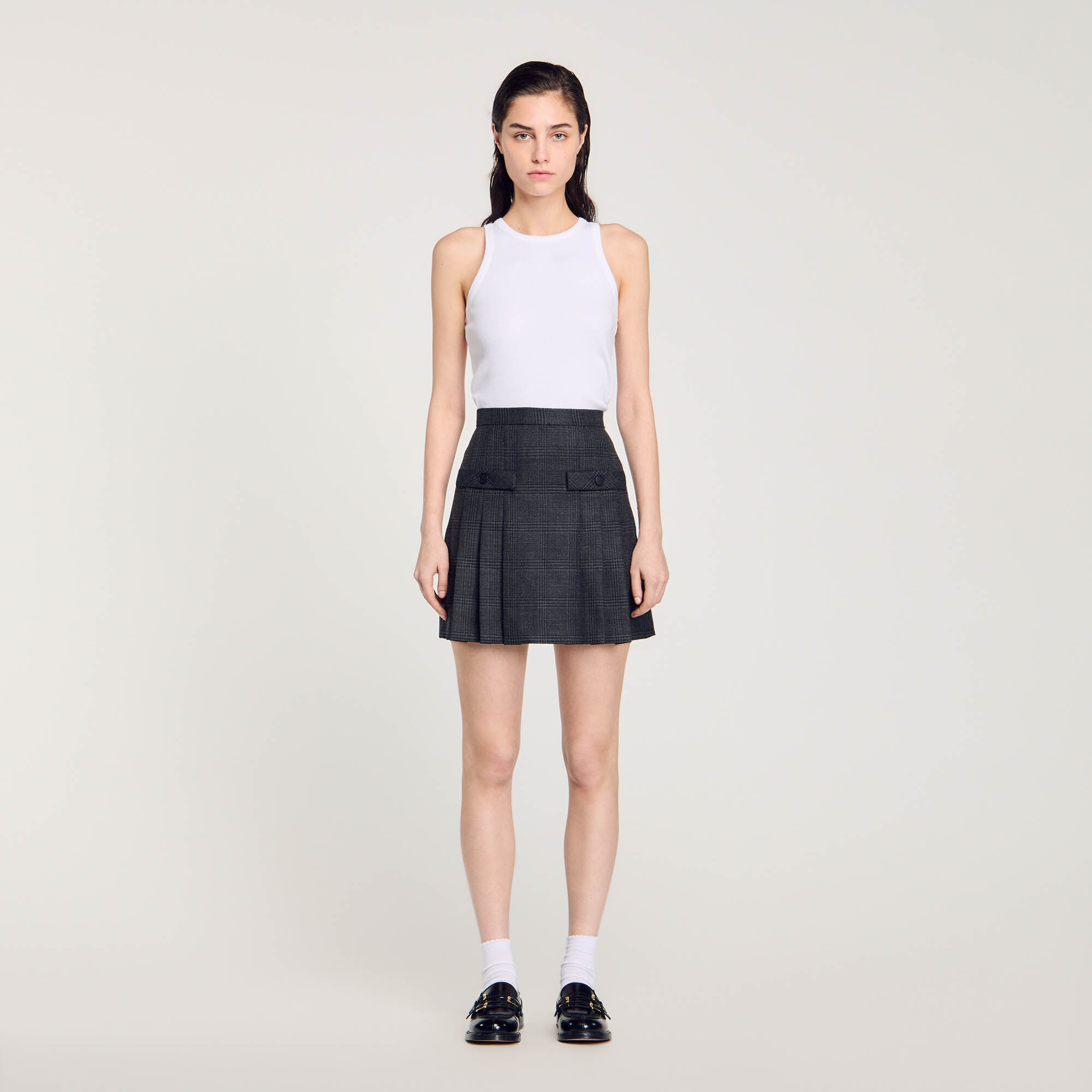 Jupe courte plissee a carreaux gris noir pour femme Sandro Paris