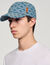 Denim cap with cross motif