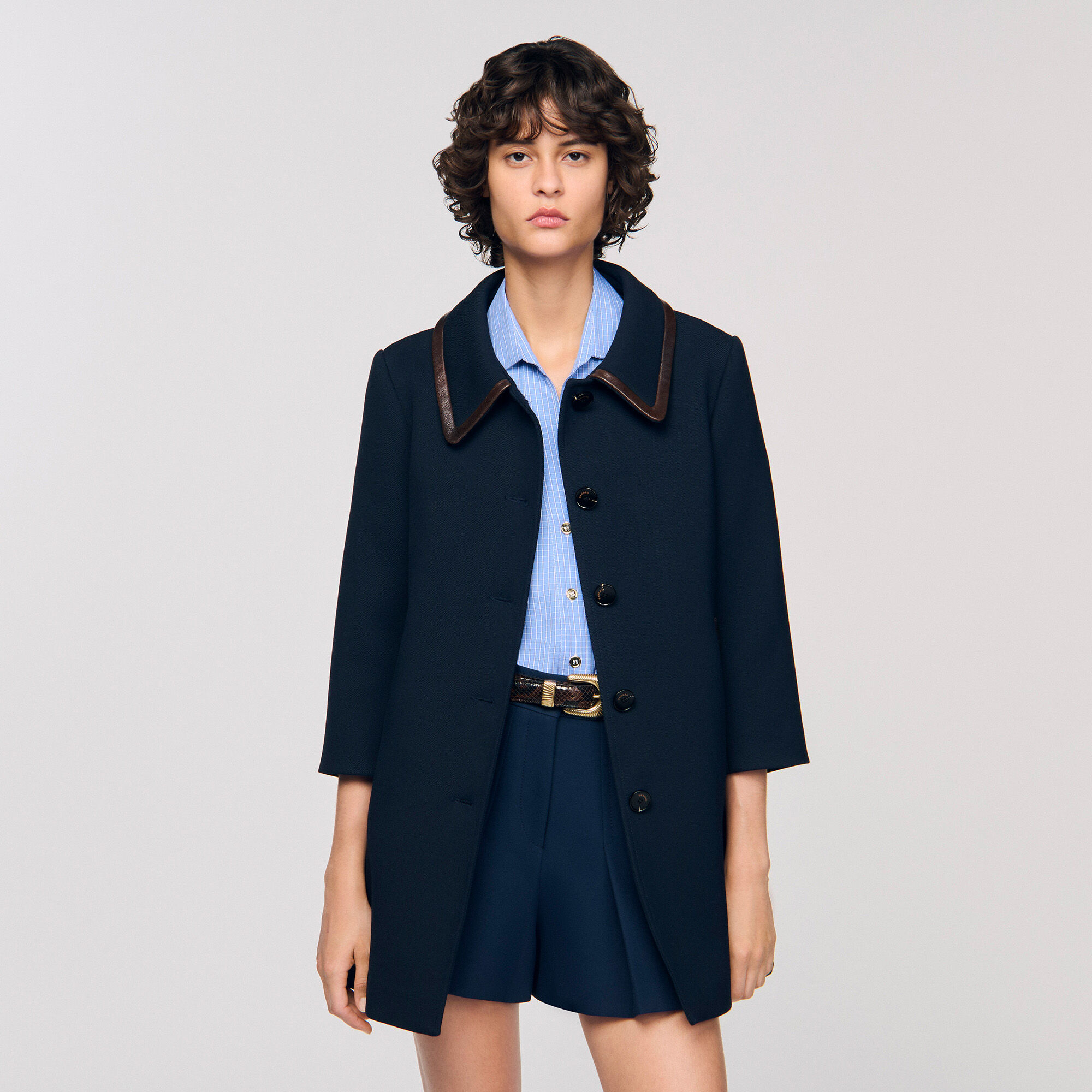 Coat with leather stripes