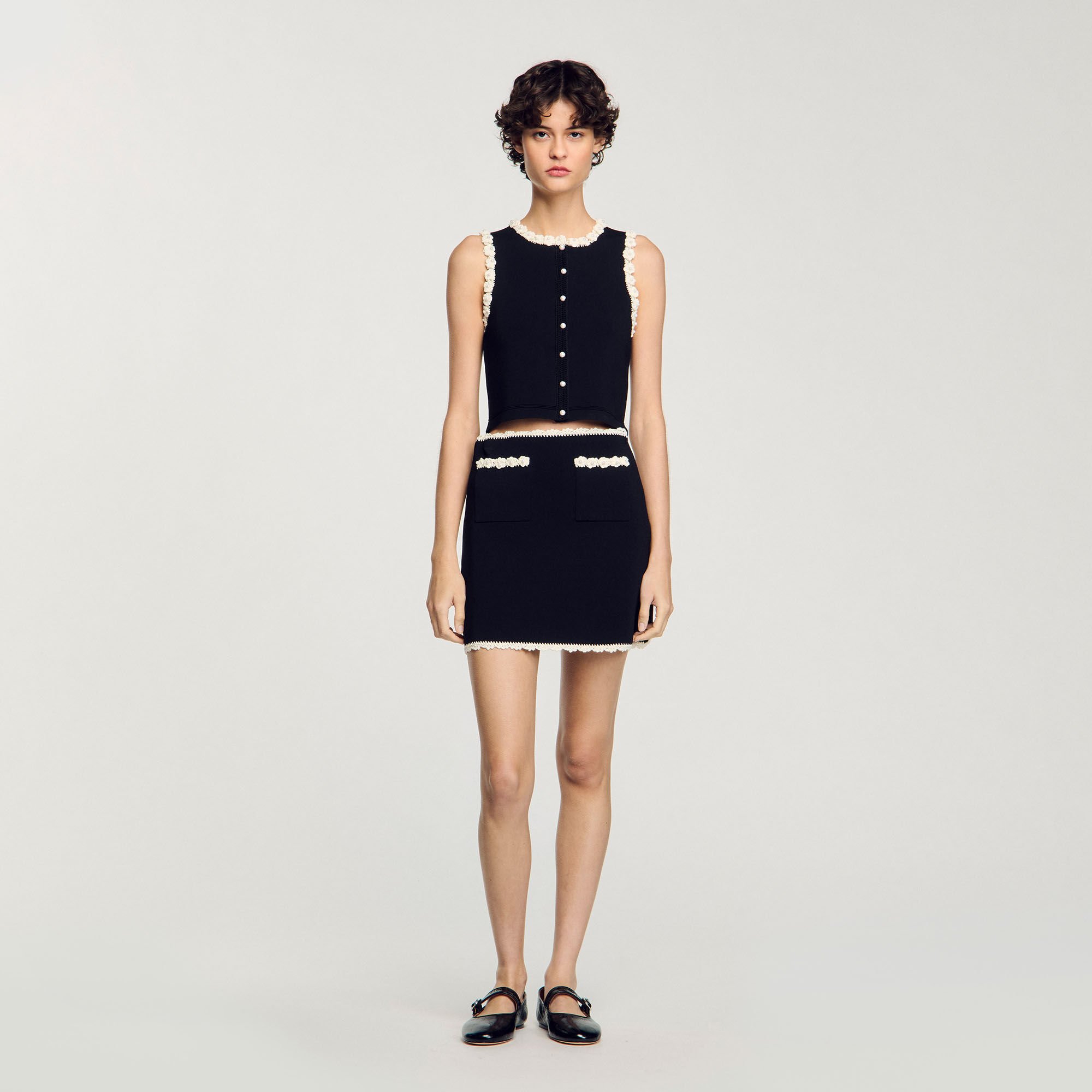 Short skirt with crochet details