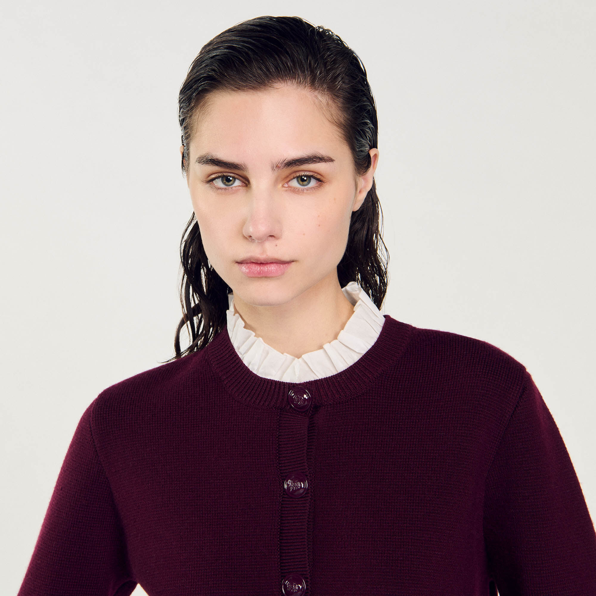 Knit cardigan with ruffled collar