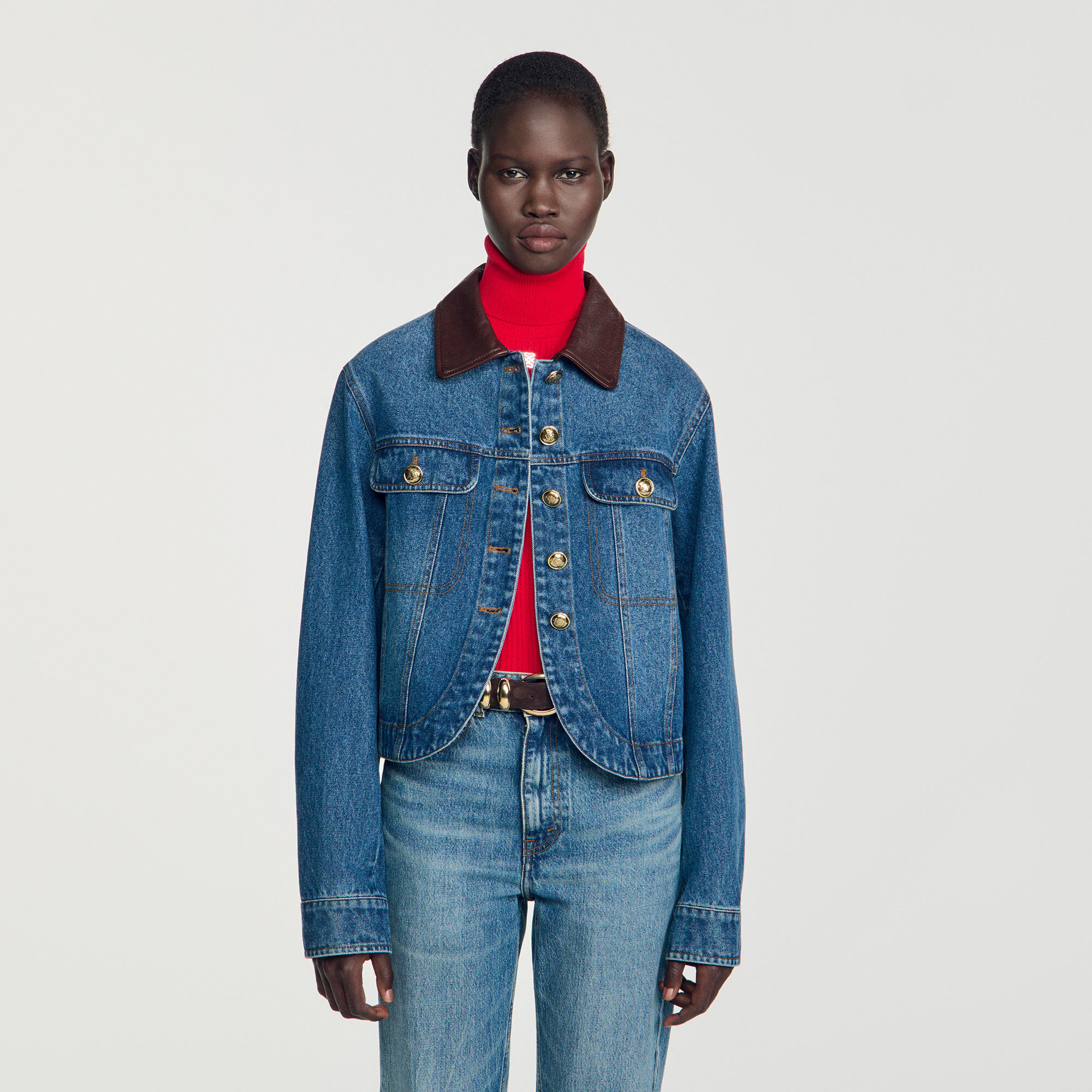 Denim jacket with leather collar