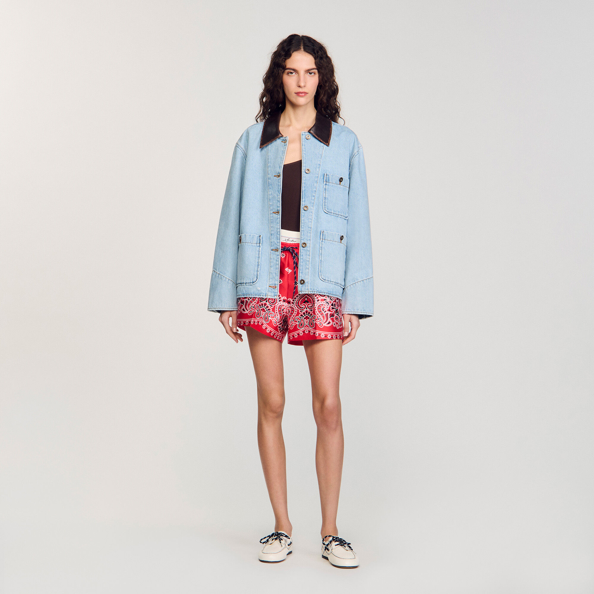 Denim jacket with leather collar