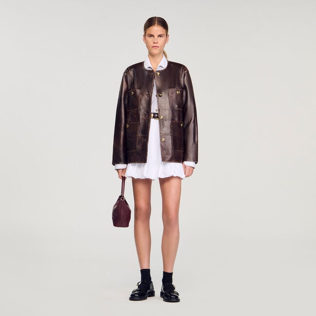 Blouson long en cuir vieilli