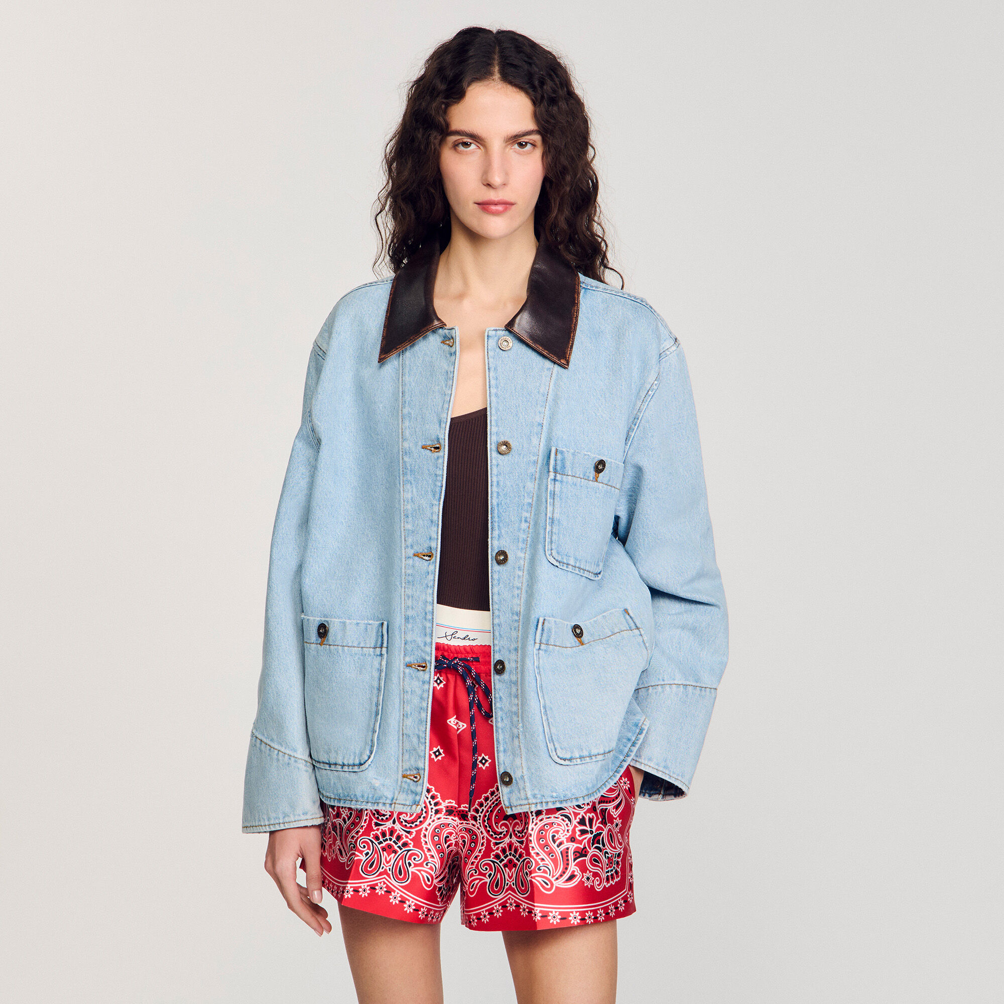 Denim jacket with leather collar