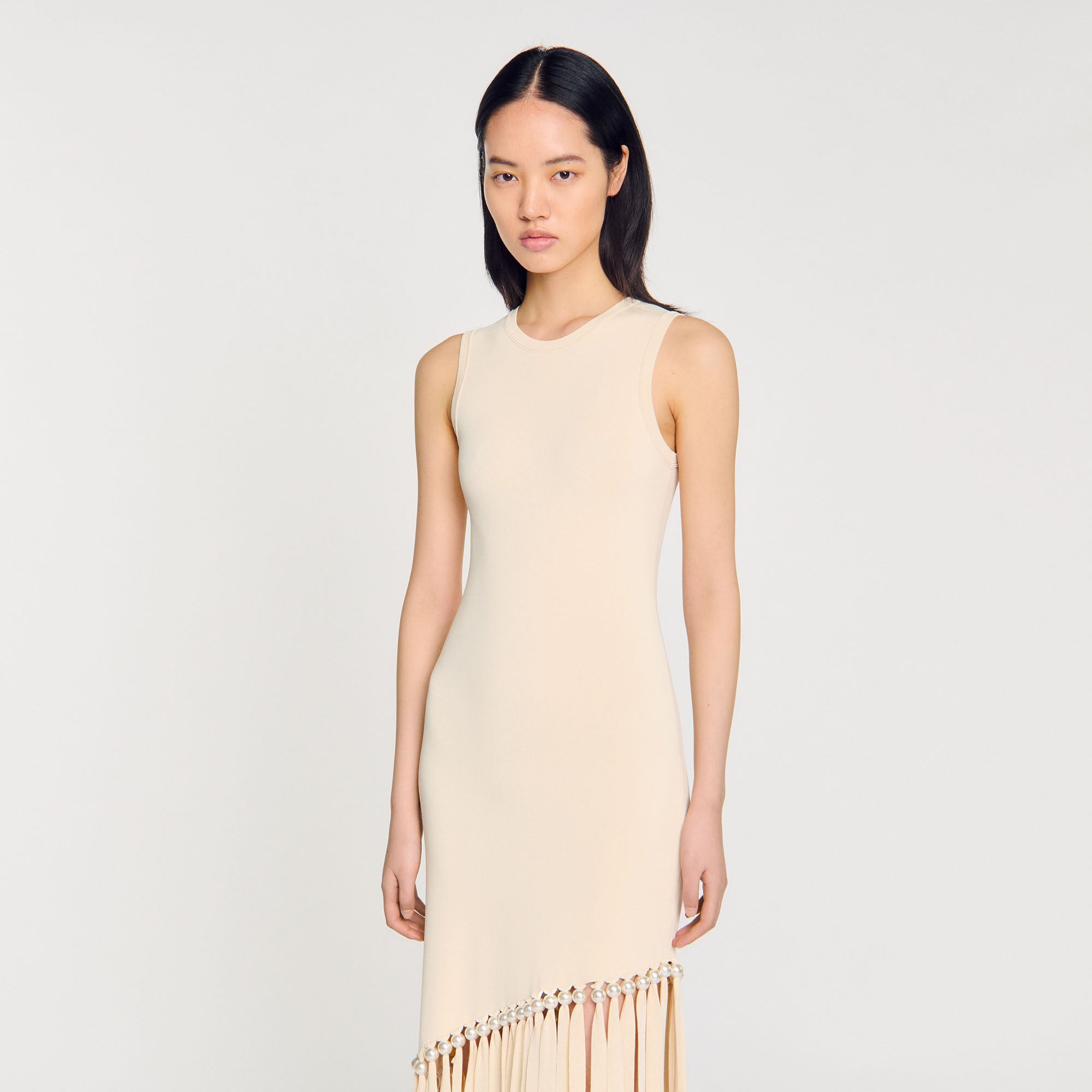 Strickkleid mit Fransen und Perlen