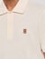 Polo shirt with leather logo