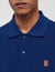 Polo shirt with leather logo