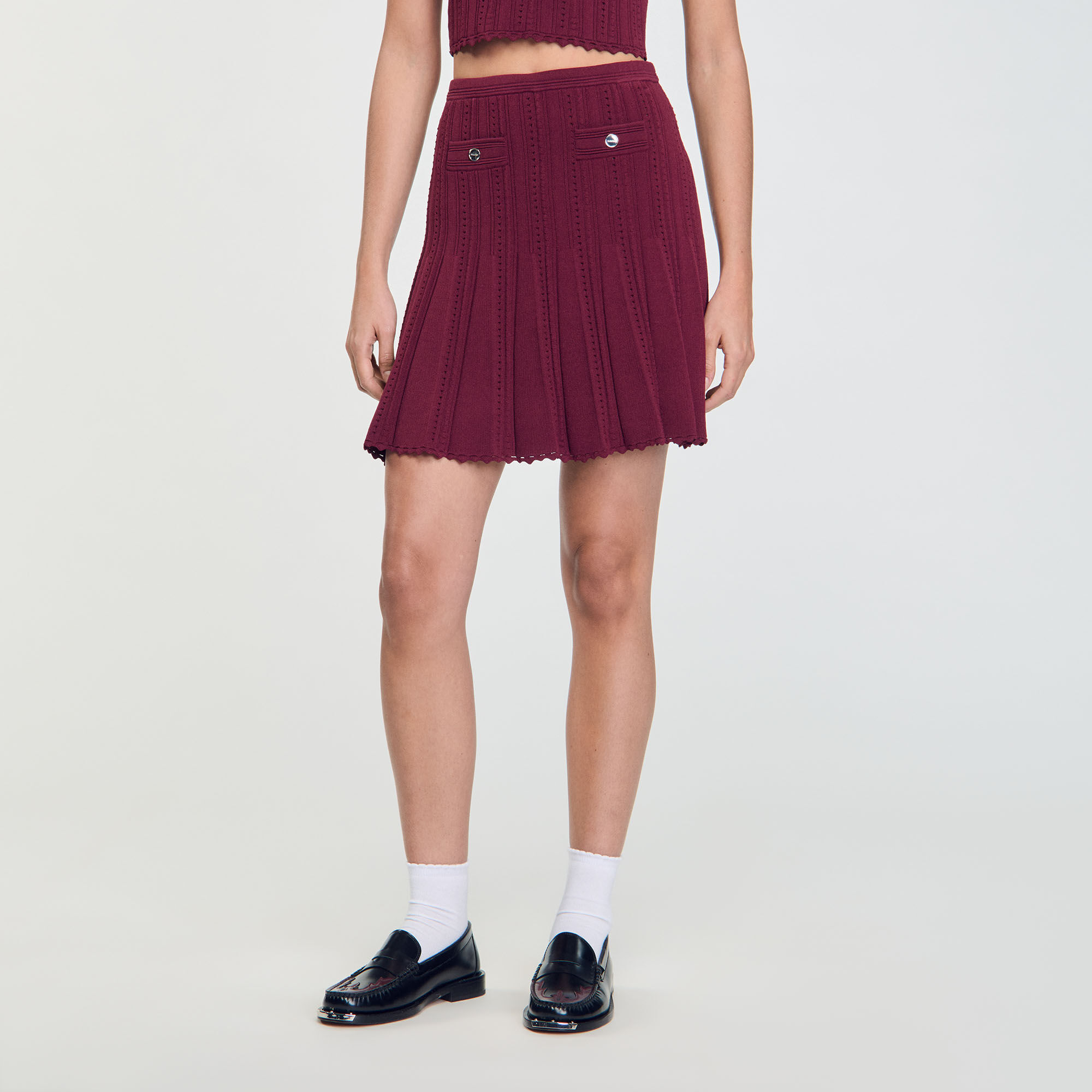 Short pleated knit skirt