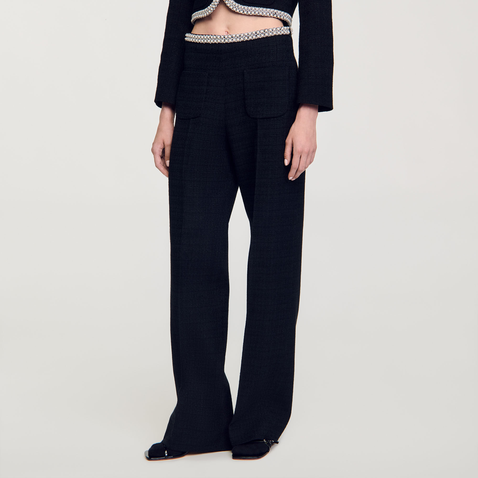 High-waisted tweed trousers