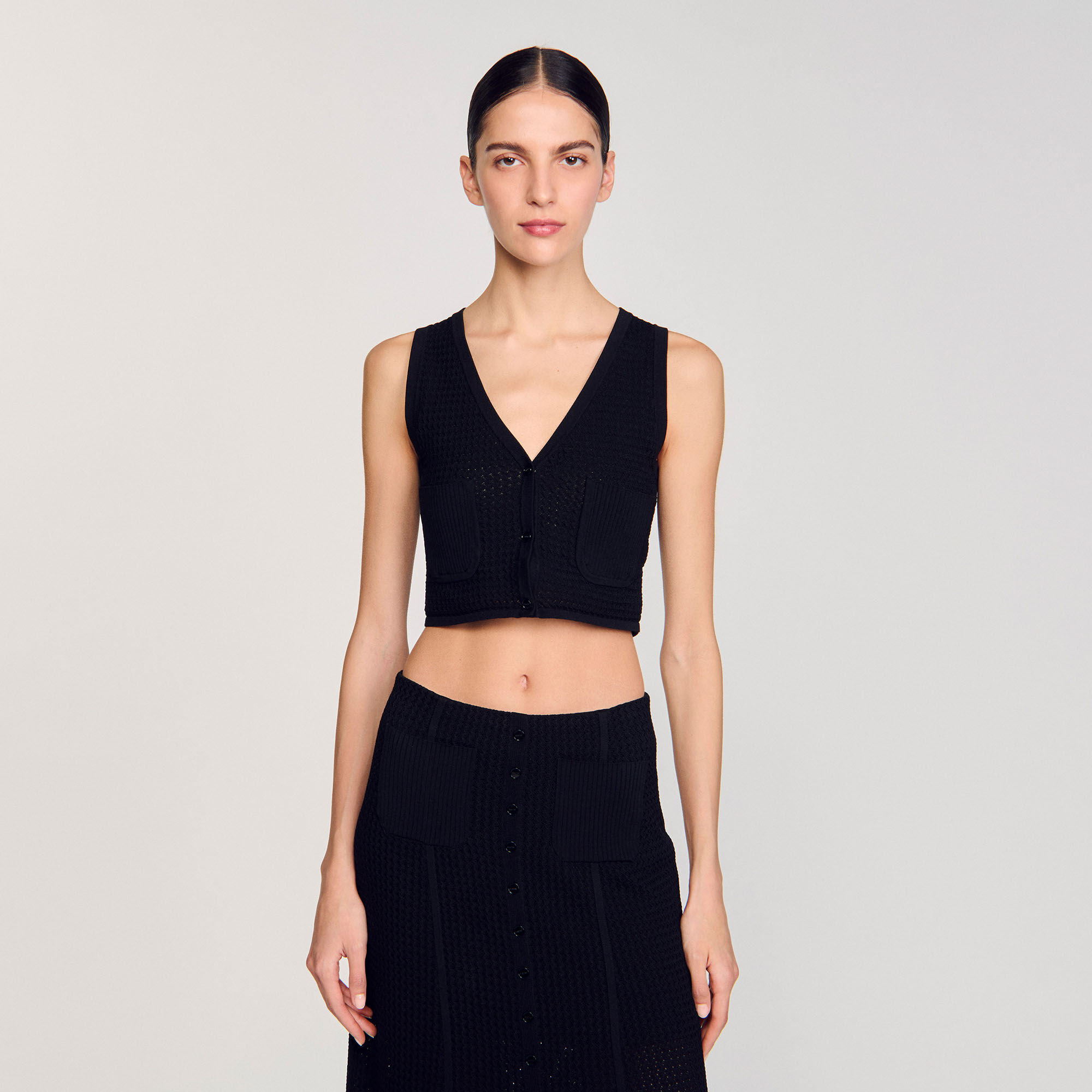 Weste mit originellem Strickmuster
