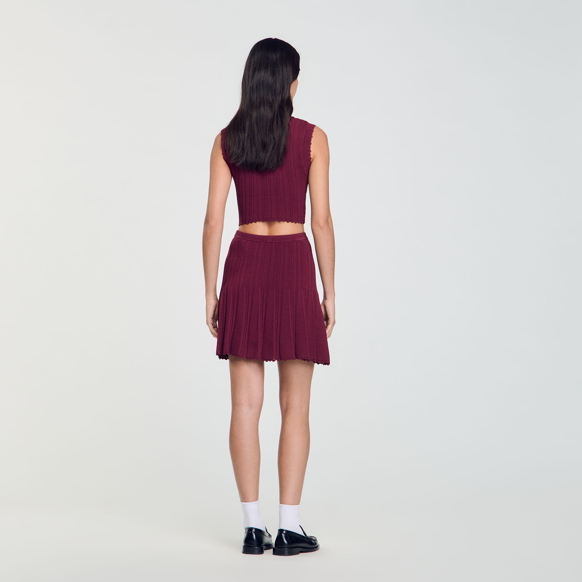 Short pleated knit skirt