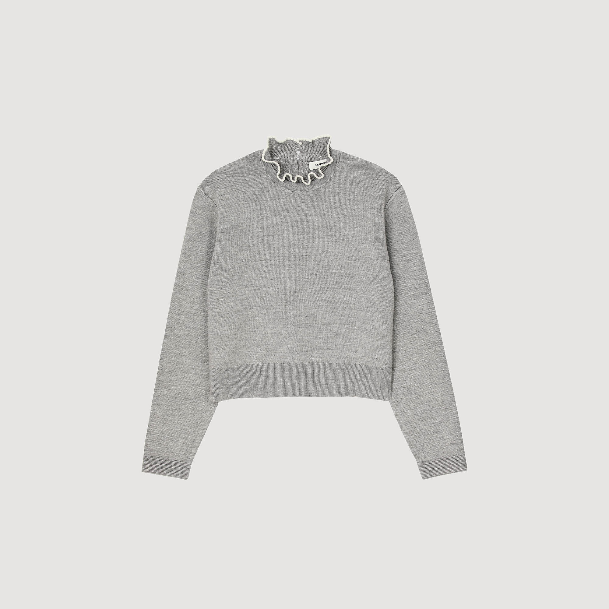 Pull à col volanté