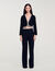 High-waisted tweed trousers