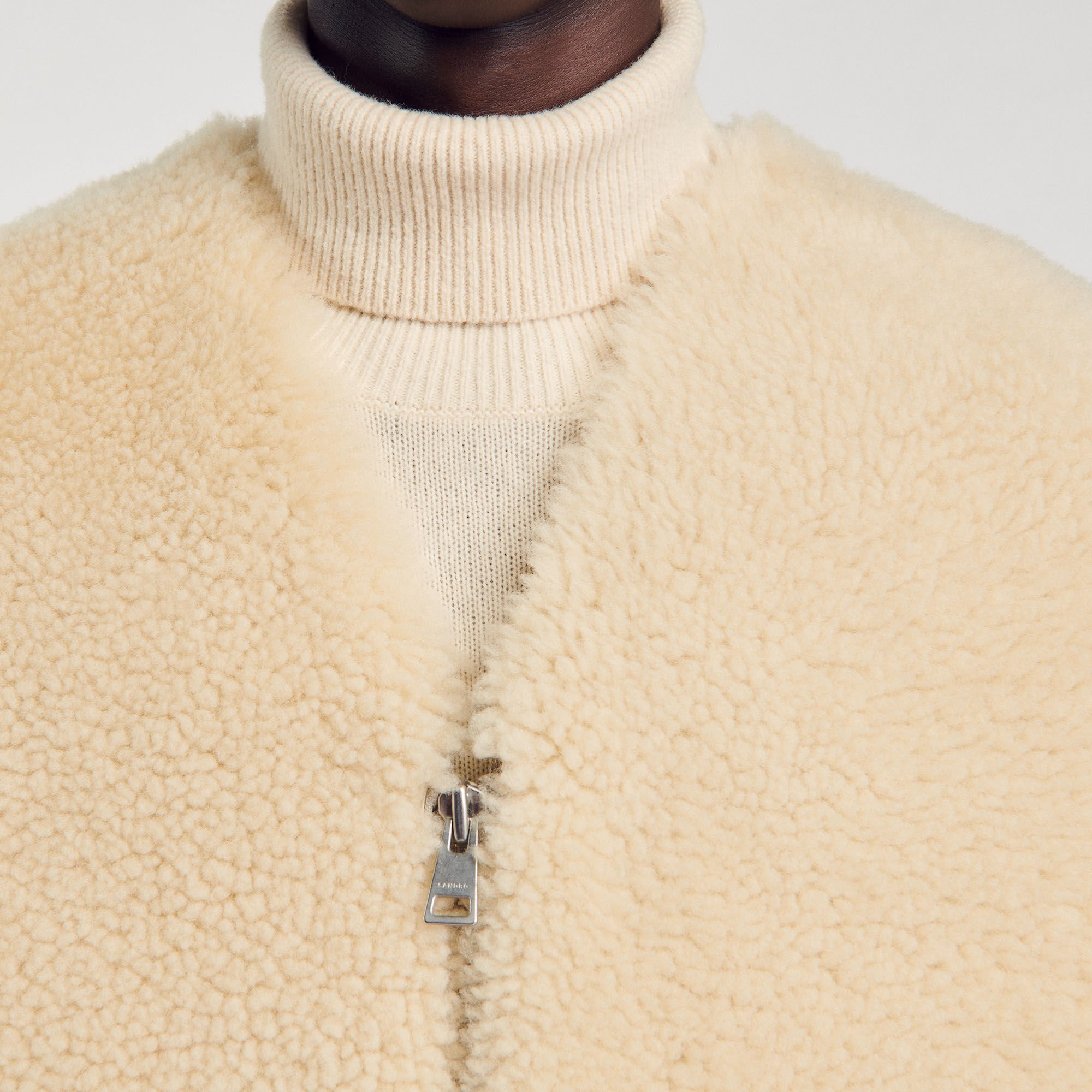 Sleeveless shearling cardigan