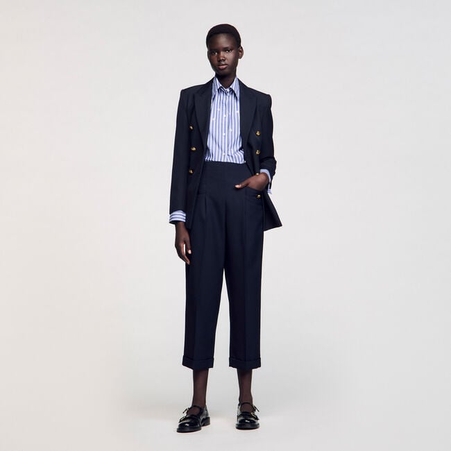 Pantalon de costume à plis