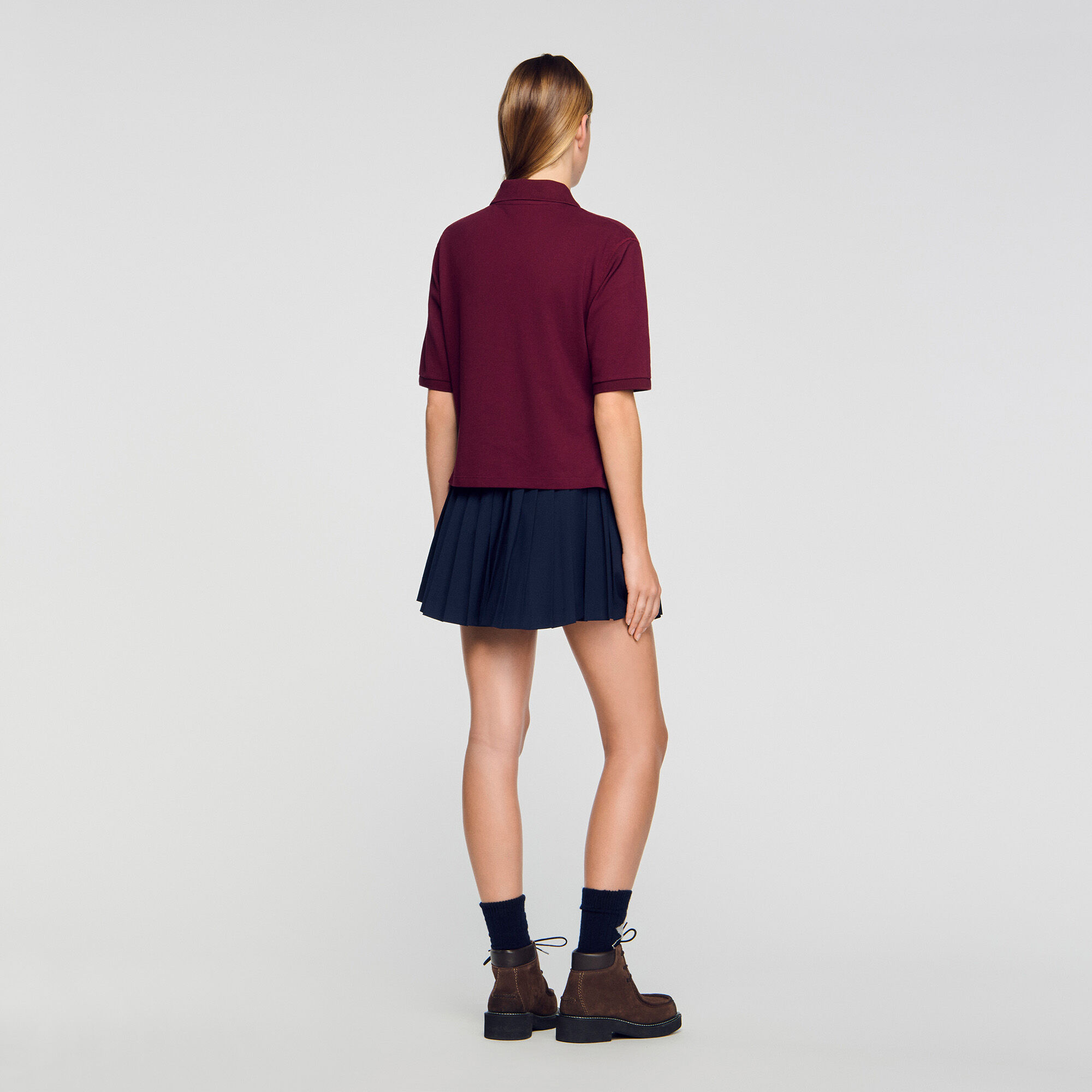 Polo shirt with decorative buttons