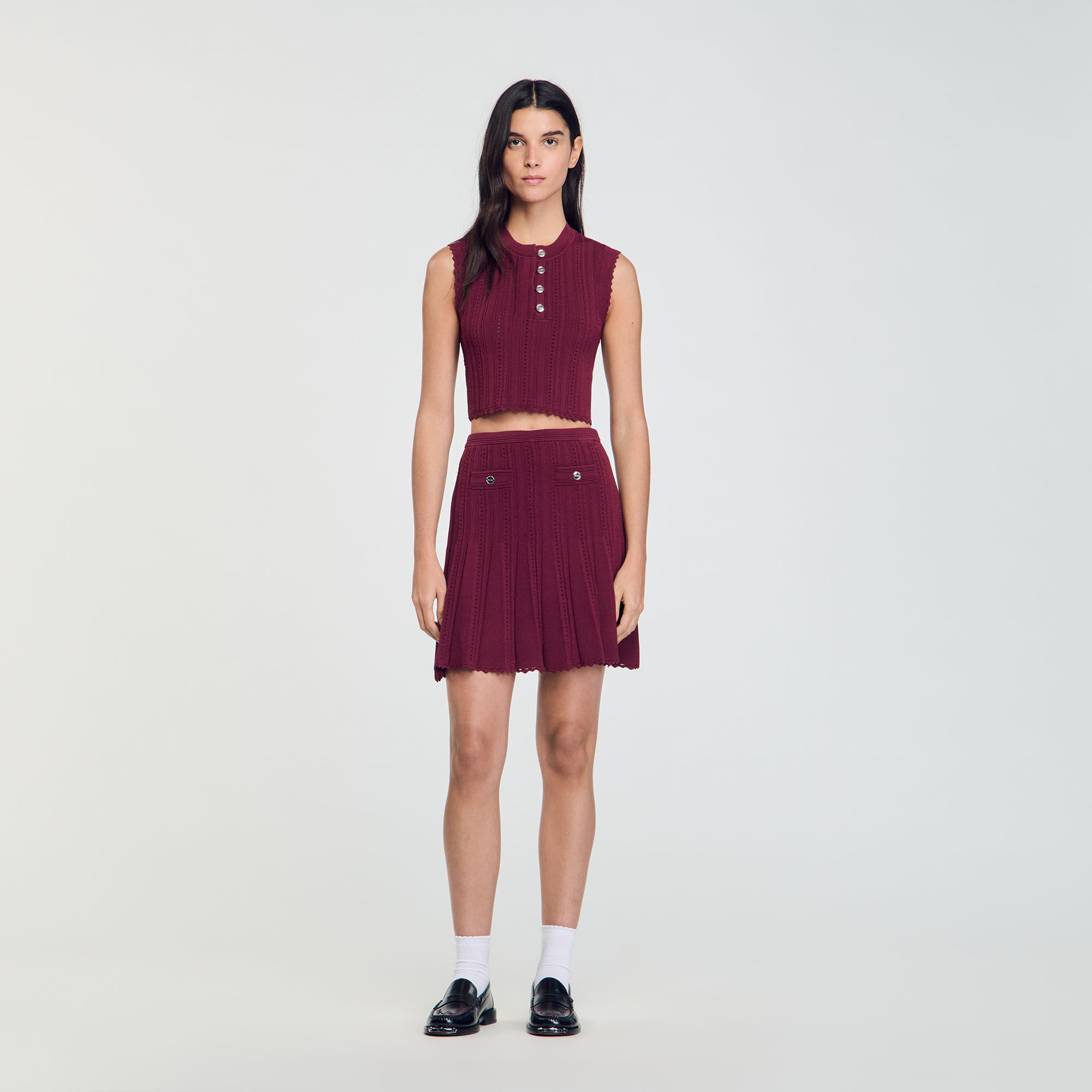 Short pleated knit skirt