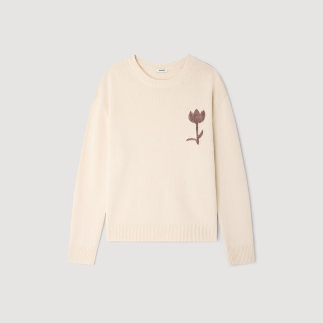 Pull en laine à détail fleur