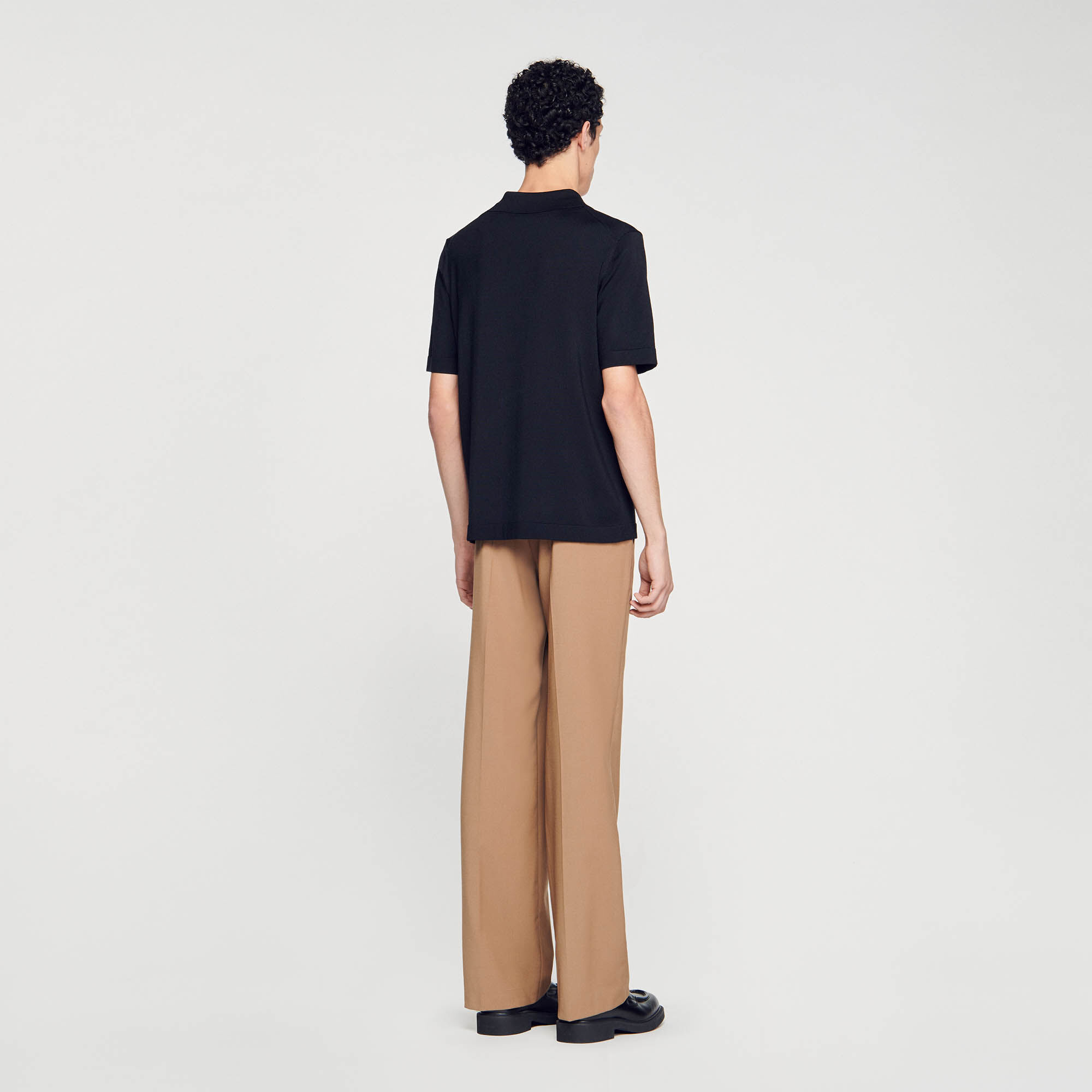 Polo en maille à col zippé