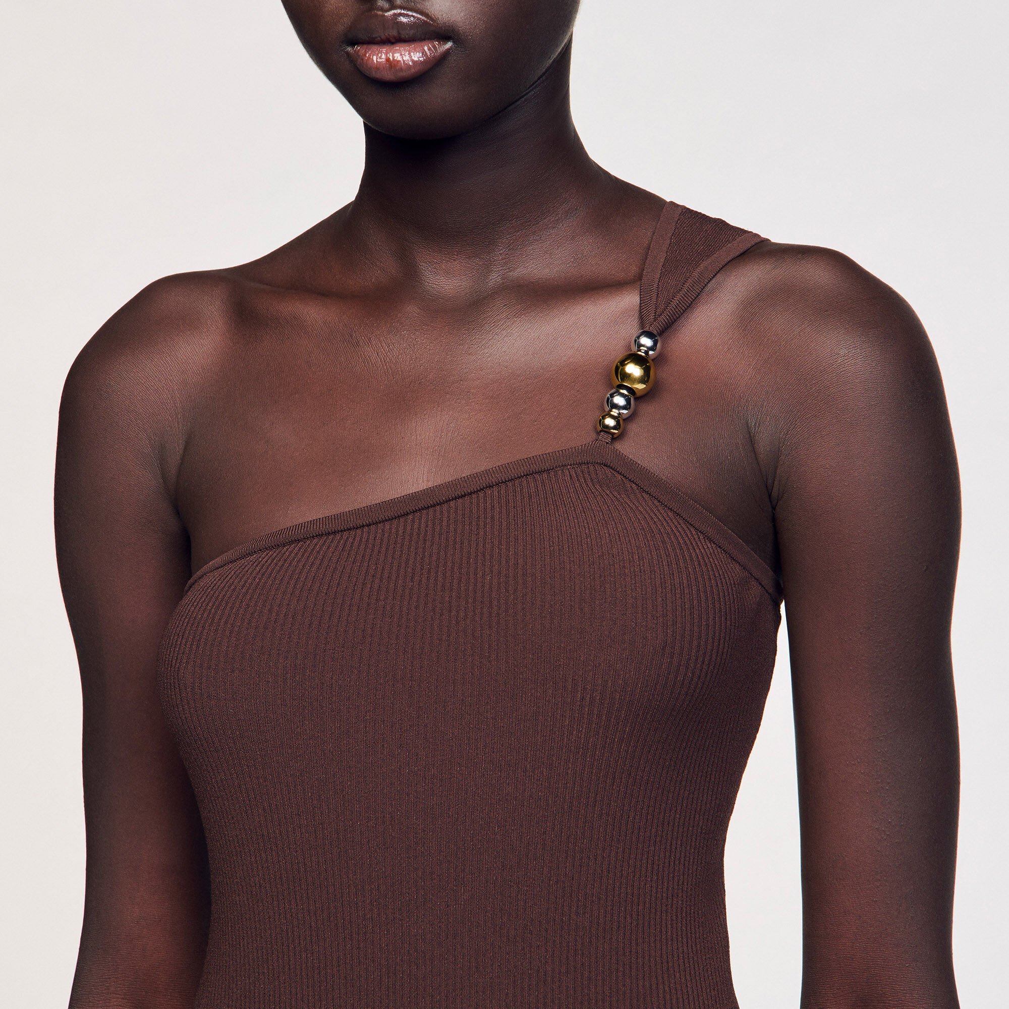 Asymmetric leotard with bead detail