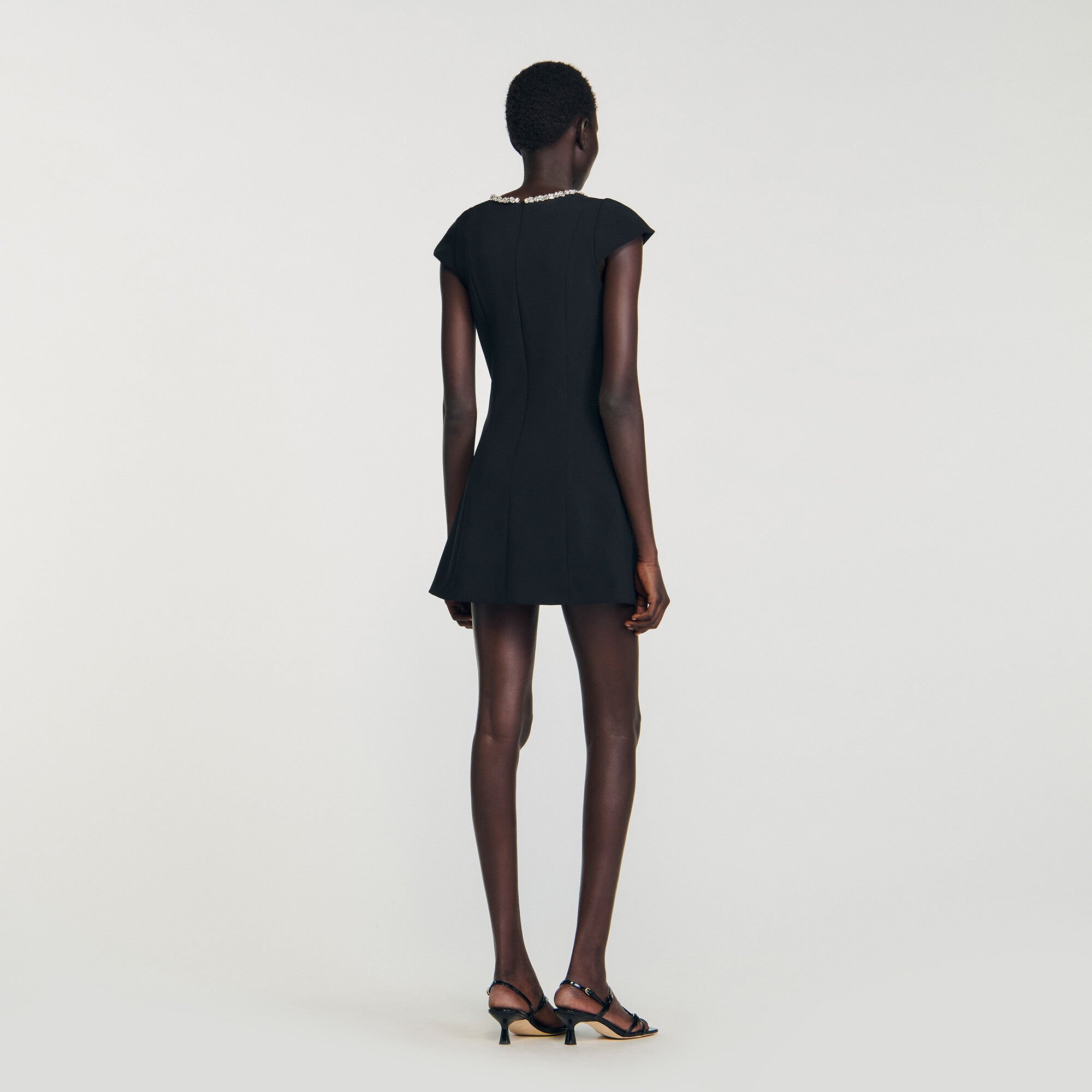 Short dress with rhinestone collar