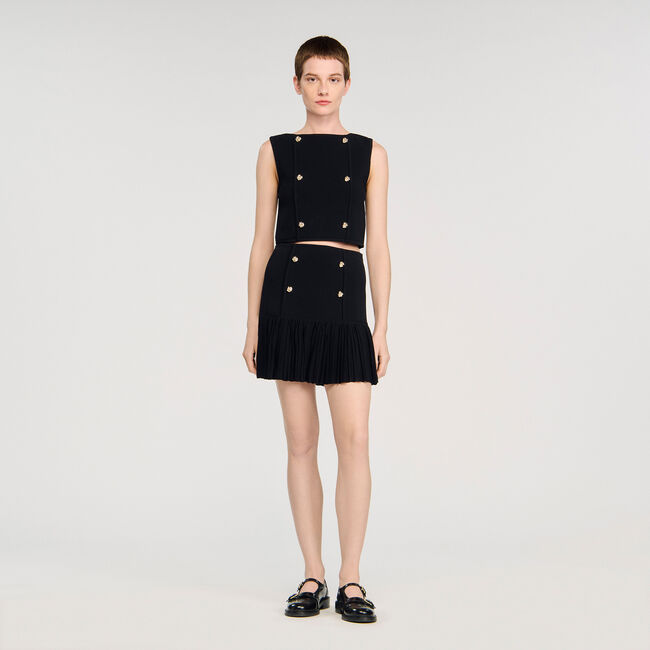 Short pleated knit skirt