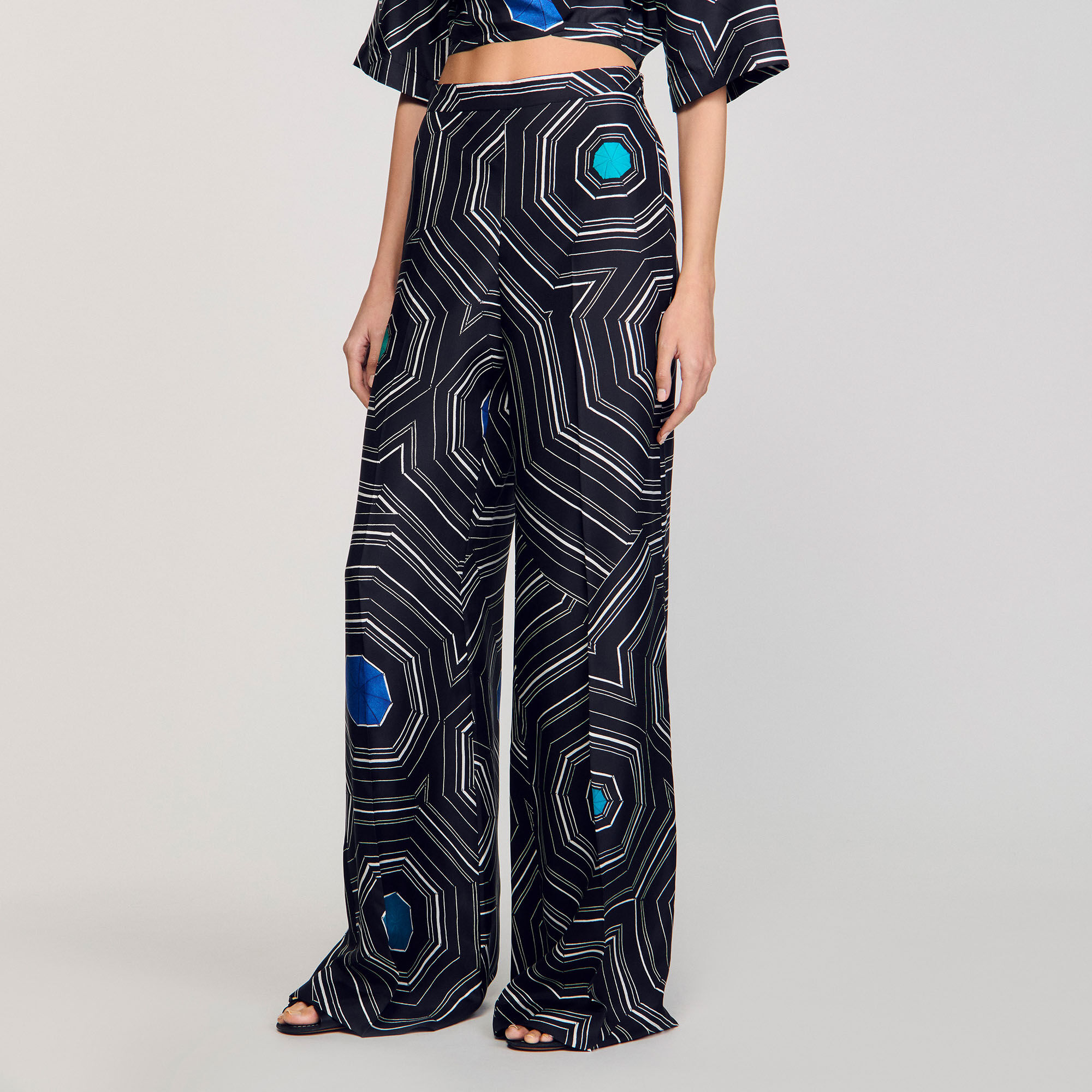 Pantalon en soie à imprimé spirales