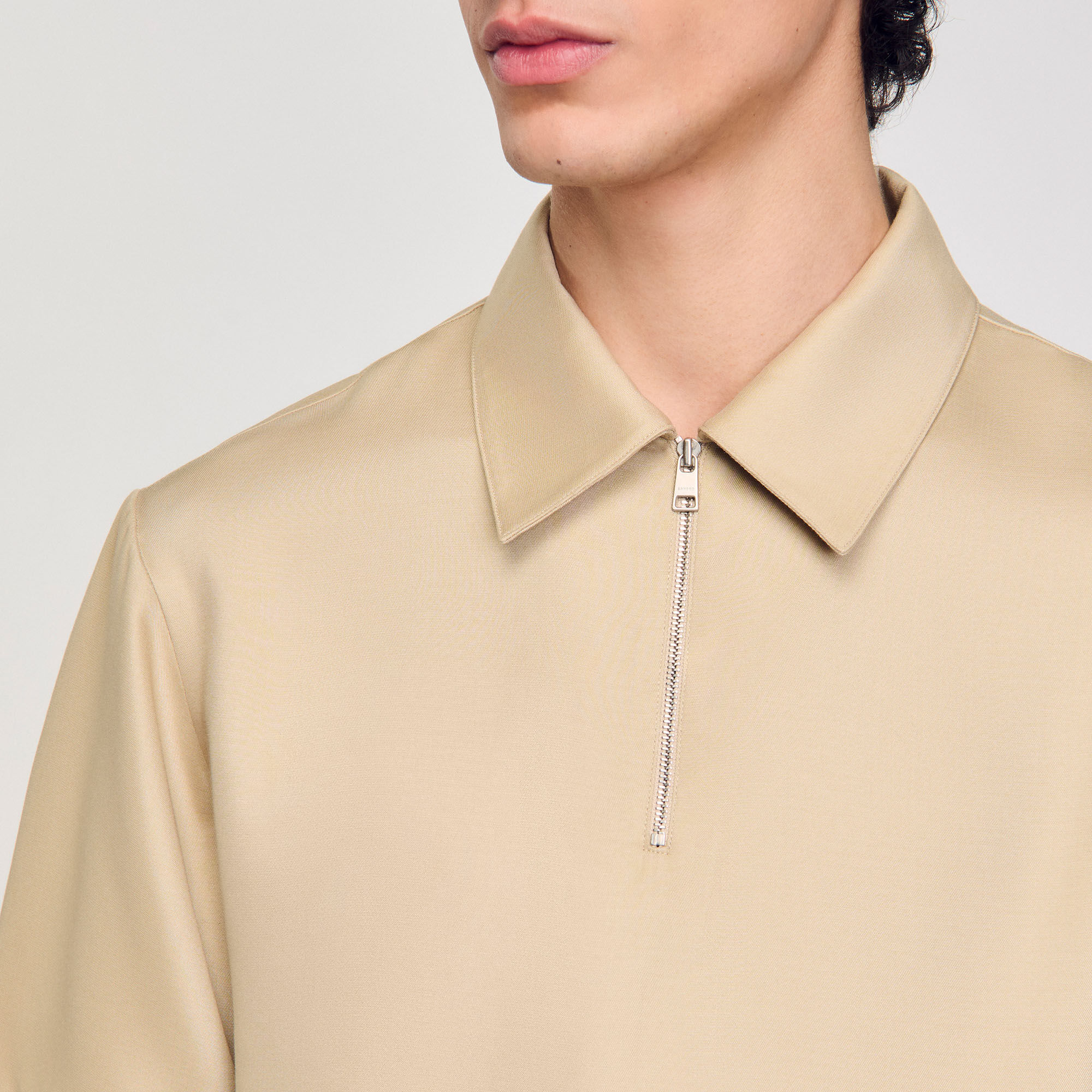 Polo à col zippé 
