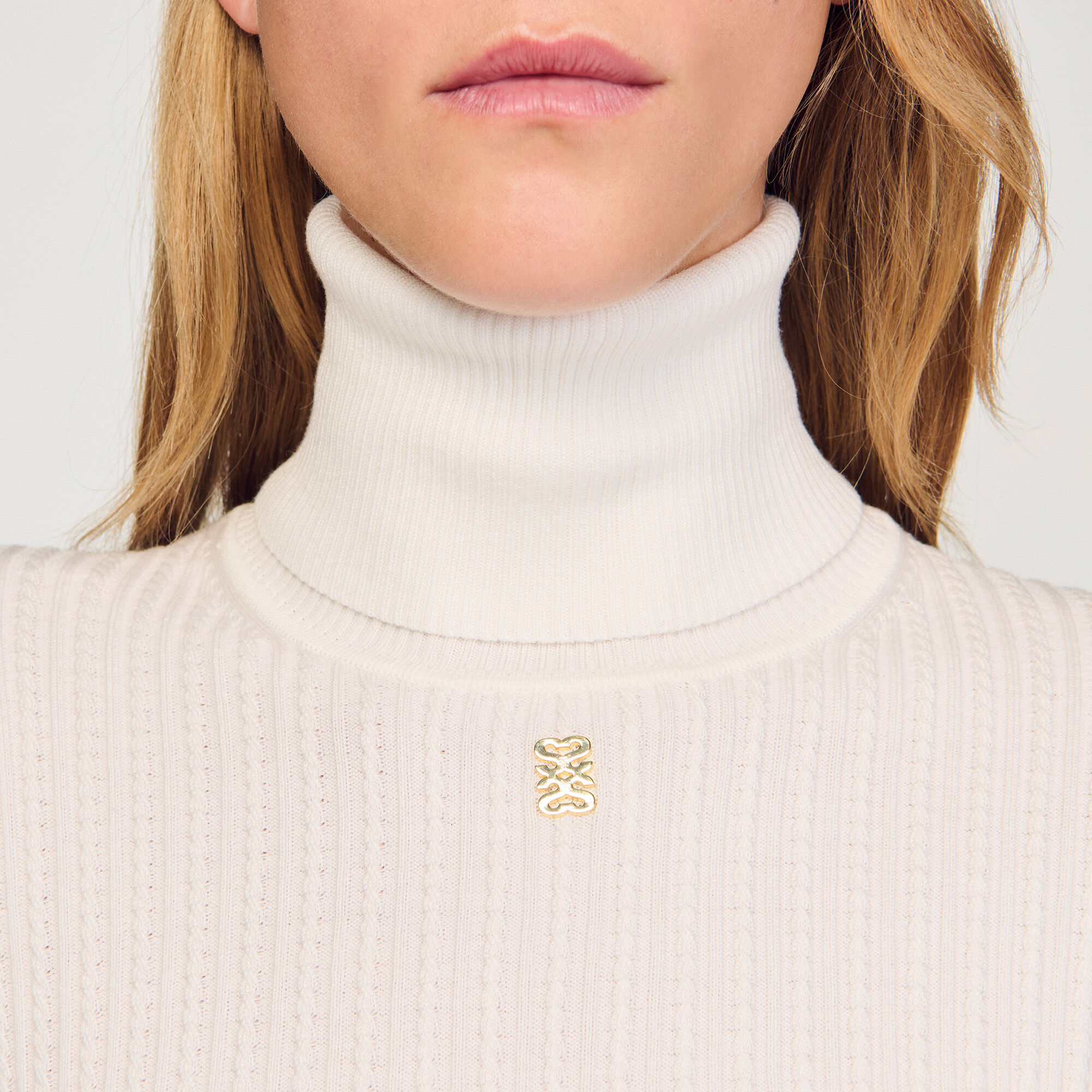 Pull col roulé