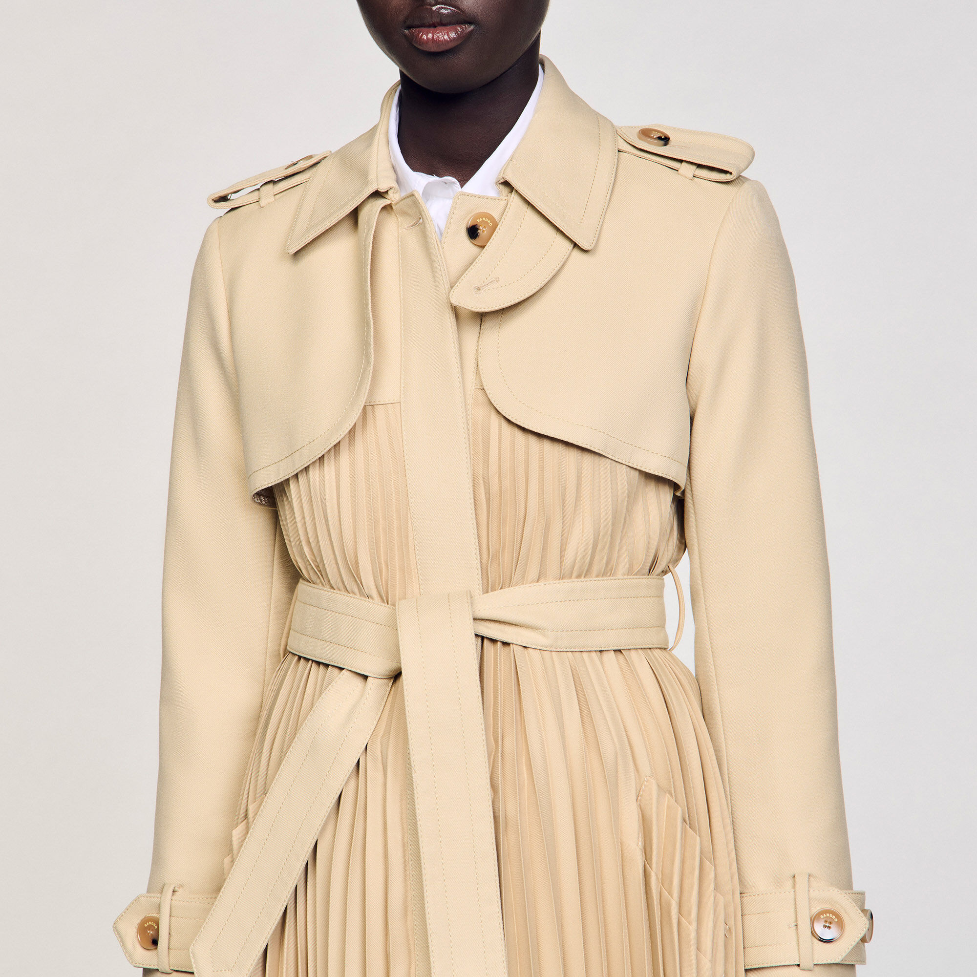 Pleated trench coat with belt