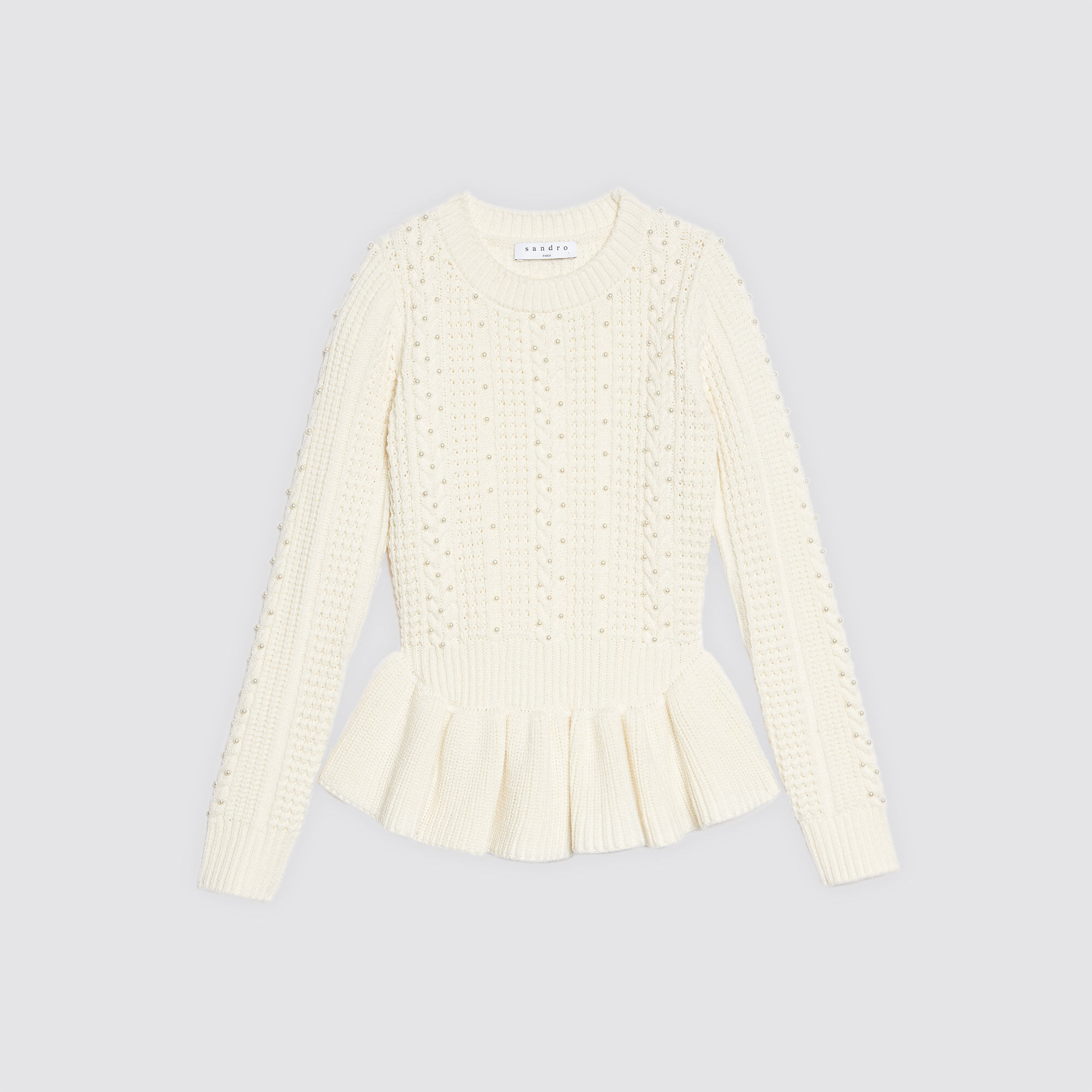 White sweater shop with pearls