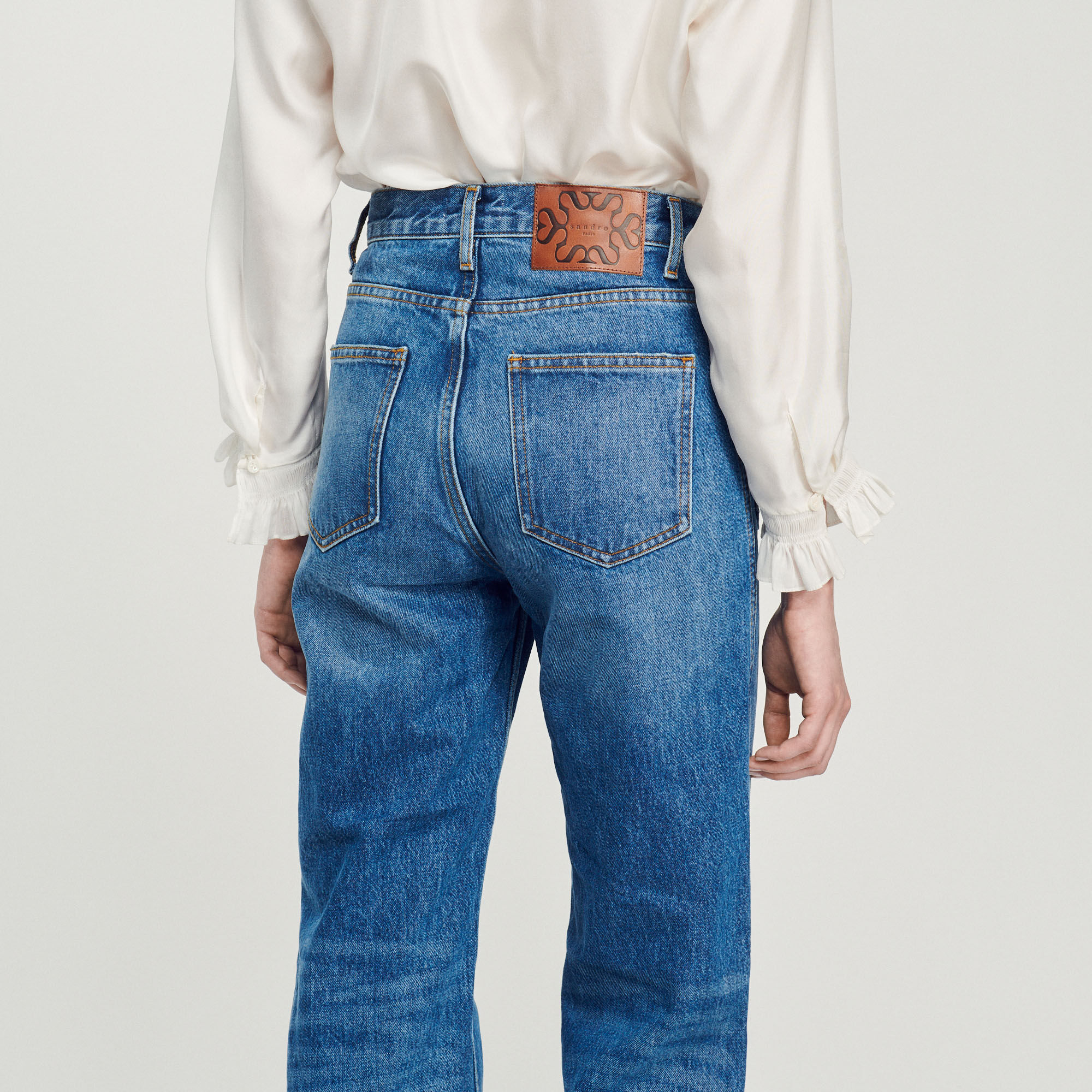 Jean deals femme délavé